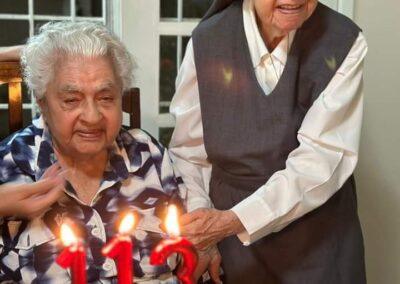 On her 113th birthday, with her daughter. (Source: Facebook)