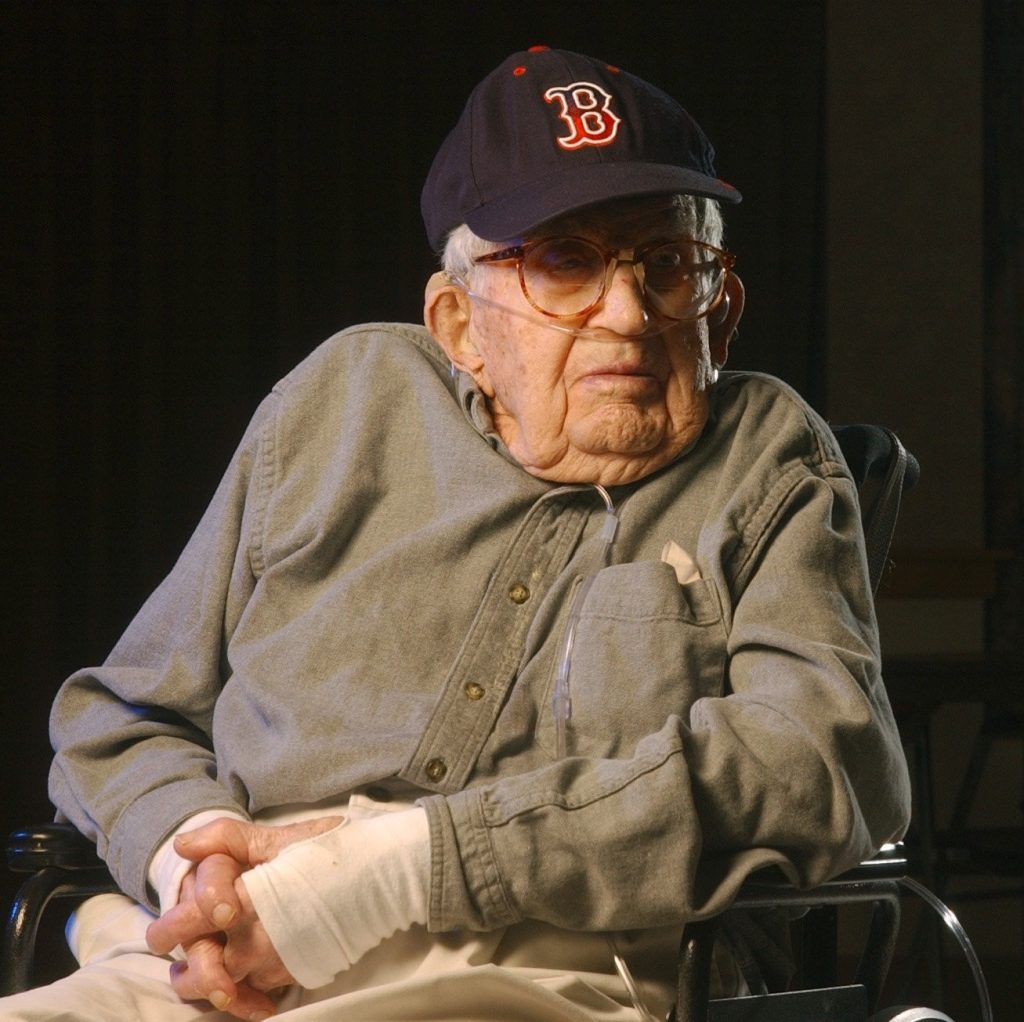 Fred Hale, one of the oldest men ever, donning a Boston Red Sox baseball cap in 2003.