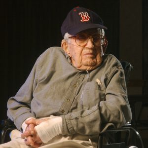 Fred Hale, one of the oldest men ever, donning a Boston Red Sox baseball cap in 2003.