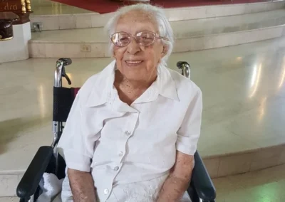 On 17 March 2019, aged 112, visiting the church where she got married and was baptized. (Source: The 110 Club)