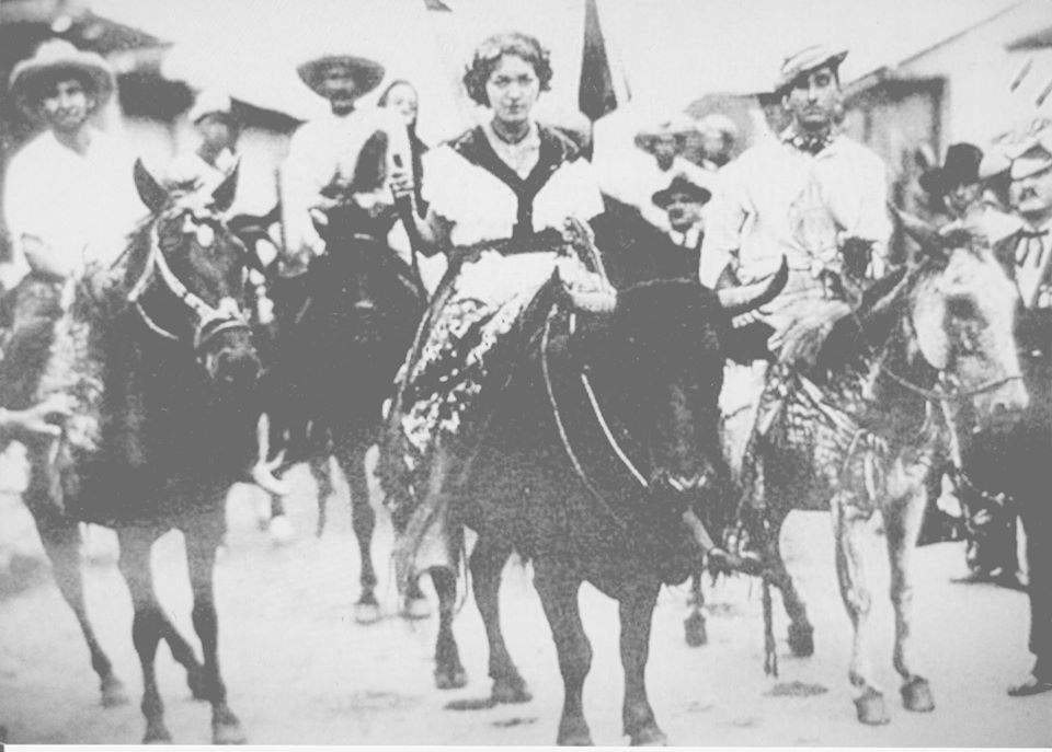 In 1931 (middle woman), on the parade for the 100th anniversary of the birth of the Costa Rican national hero, Juan Santamaría. (Source: Gerontology Wiki)
