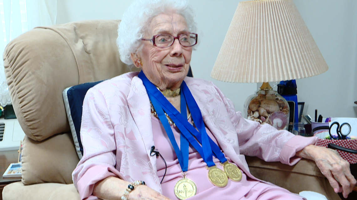 Aged 109, wearing three medals she won as a centenarian at the Northern Virginia Senior Olympics (for Mexican Domino). (Source: WUSA9)