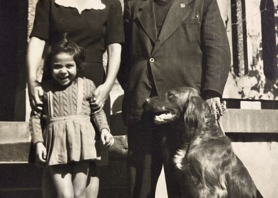 With her husband and their daughter. (Source: HMTC)