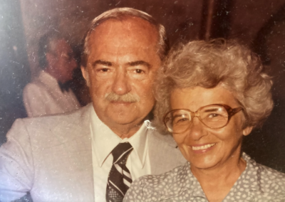 With her second husband. (Source: HMTC)