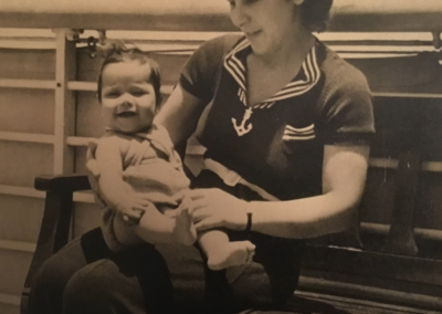 With her daughter. (Source: HMTC)