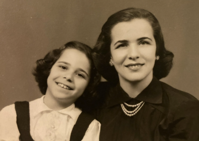 With her daughter. (Source: HMTC)