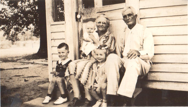With her husband and their grandchildren. (Source: Courtesy of family)