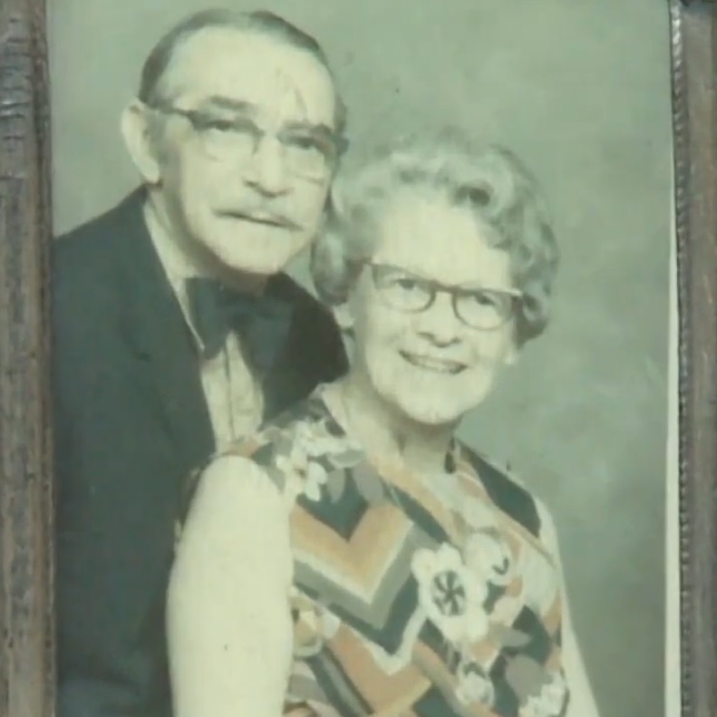 As an elderly woman, with her husband. (Source: YouTube/USA TODAY)