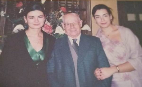 Undated, with his granddaughters. (Source: Adoronews)