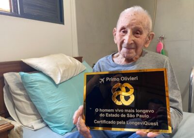 On 6 December 2025, with LongeviQuest plaque.