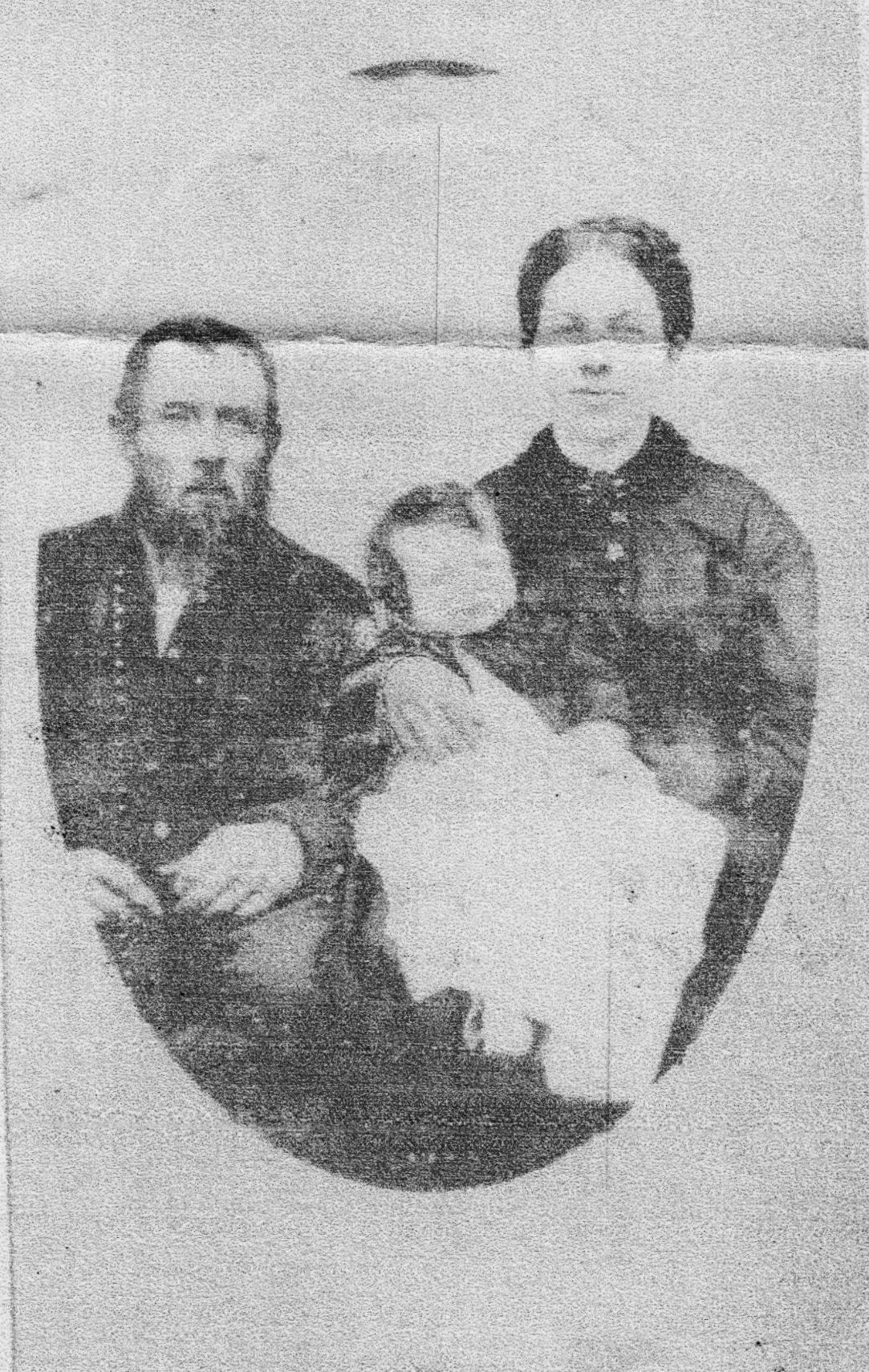 As an infant, with her parents. (Source: Find A Grave)