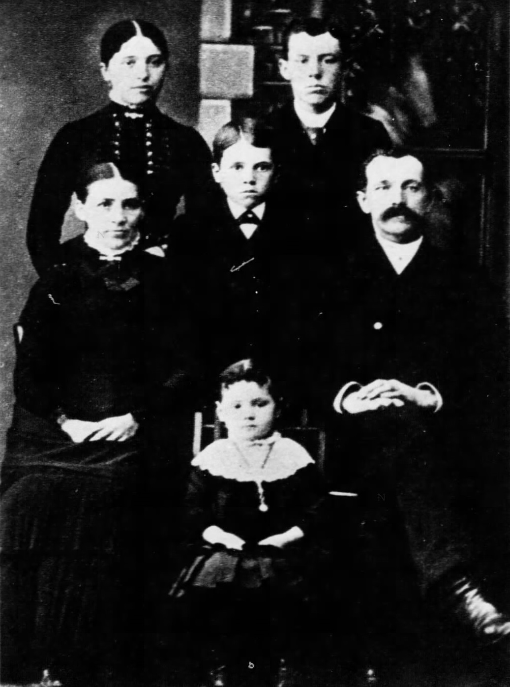 Taylor (sitting at left) in 1888, aged 38, with her husband and their four children. (Source: Detroit Free Press)