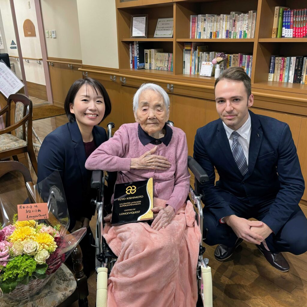 LongeviQuest visited Fuyo Kishimoto on her 112th birthday.On the photo: Yumi Yamamoto (left), Fuyo Kishimoto (center), and Jack Steer (right)