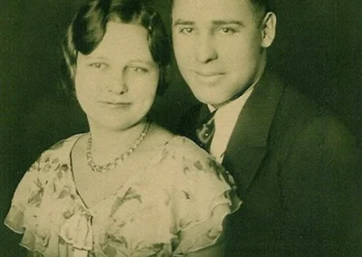 With her husband. (Source: The 110 Club)