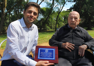 On his 108th birthday, with LongeviQuest representative, Daniel Germán Delgado.