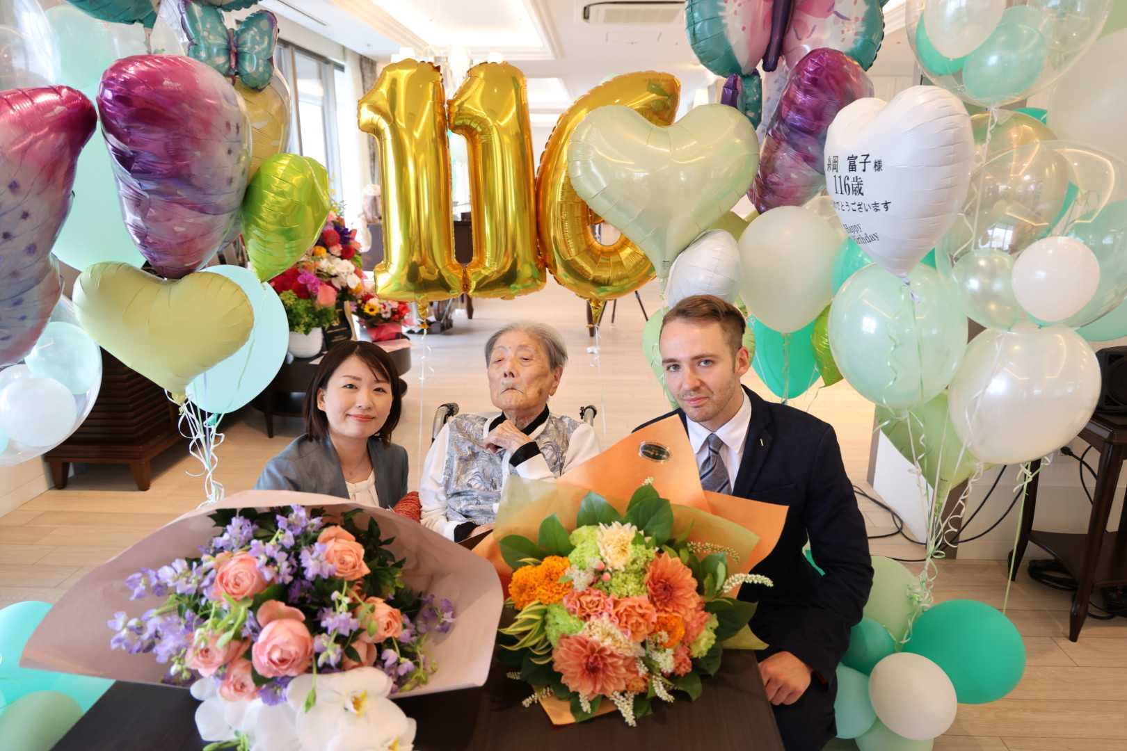 Yumi Yamamoto, Tomiko Itooka, and Jack Steer at Itooka-san's 116th birthday party. Photo by LongeviQuest.