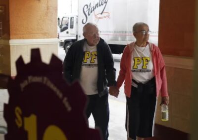 Shortly before his 105th birthday, arriving to gym with his wife. (Source: Naples Daily News)