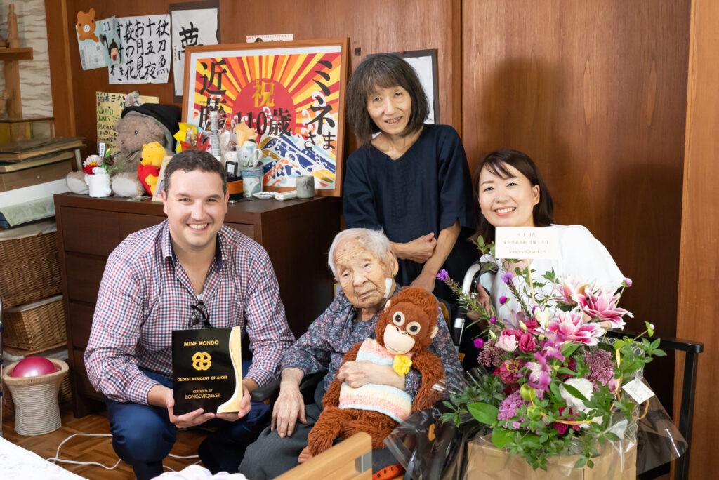 During LQ visit in August 2024. From left to right: Ben Meyers (LQ), Mine Kondō, age 113 (近藤ミネ), Naomi Yagami, granddaughter of Kondō-san (八神直美), Yumi Yamamoto (LQ).