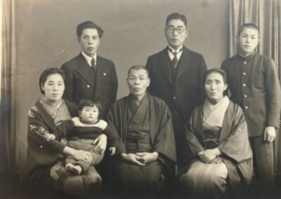 Komatsu (seated on the left) in her 30s. (Source: Courtesy of the family)