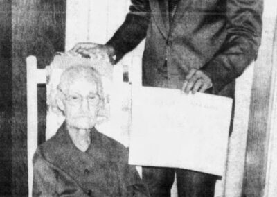 On her 106th birthday in 1986, with State Senator Cecil Picard. (Source: Abbeville Meridional)