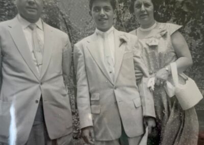 With her husband and their son. (Source: Dignity Memorial)