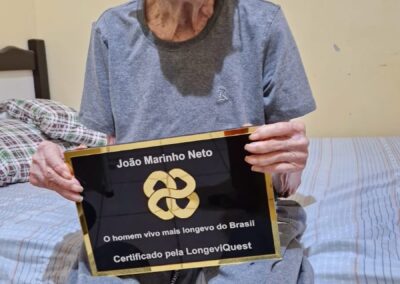 On 12 December 2024, with LongeviQuest plaque.