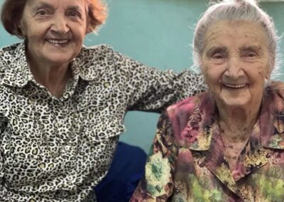 At 107, with her younger sister, Maria (aged 95).