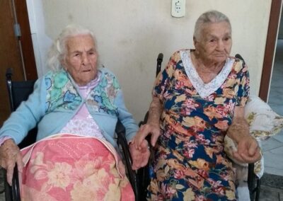Maggioni, aged 104, with her younger sister, Anna, aged 103. (Source: Courtesy of the family)