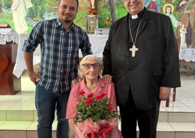 Aged 109, with Father Edegar Passaglia (left) and Bishop Adimir Antonio Mazali (right) (28 February 2026).