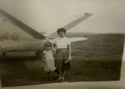 With her daughter, next to an airplane bound for Dourados, Mato Grosso do Sul.