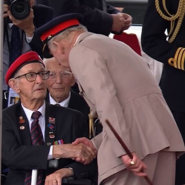 King Charles III greeting Owen Filer