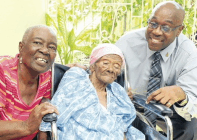 On her 110th birthday, with her daughter, Daphne Bennett, and grandnephew, Ian Forbes. (Source: Jamaica Observer)