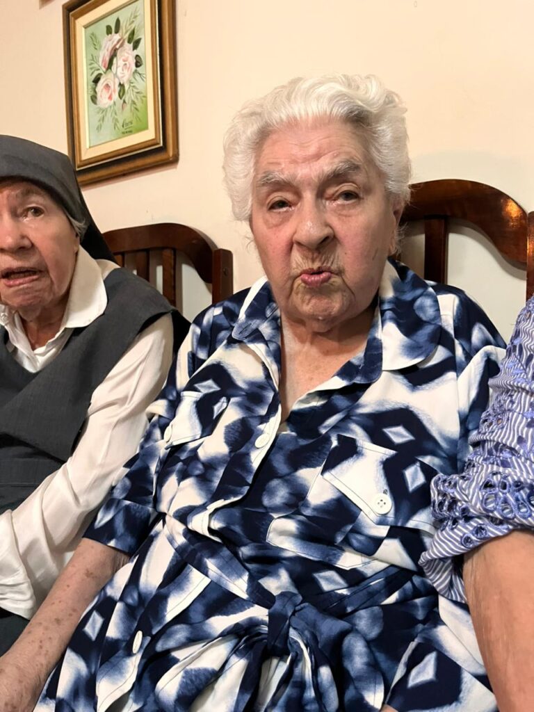 Yolanda, 115, blowing a kiss.