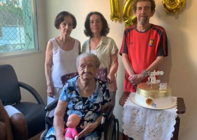 On her 108th birthday, with her children.
