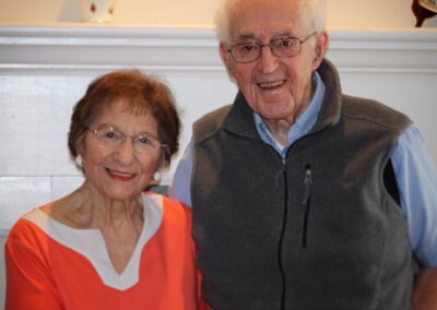 In his centenarian years, with his wife, Marie. (Source: Facebook / Rice Memorial High School)