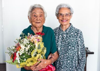 On her 100th birthday, with her oldest niece, Etelvina.