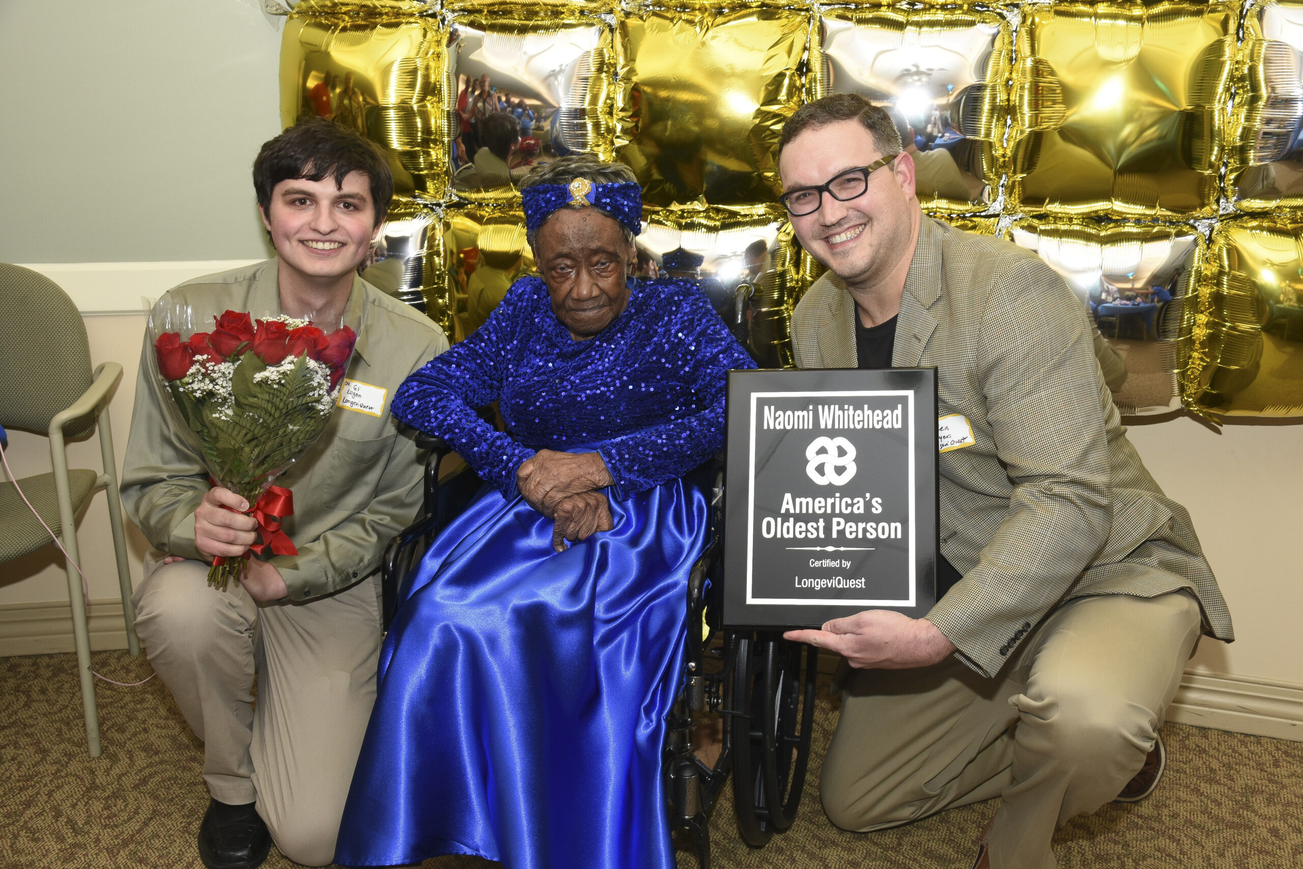 Naomi Whitehead with LongeviQuest Oldest Living American plaque.